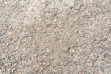 Background crushed stone poured into concrete. Crushed stone or gravel, used for pouring flooring. texture.