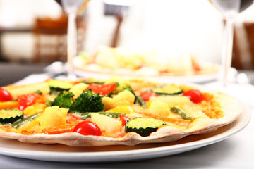 Pizza with tomato, meat and ananas toppings