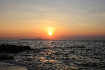 Sunset over the sea and island