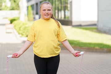 Kid's having cardio workout during a weight loss summer camp.