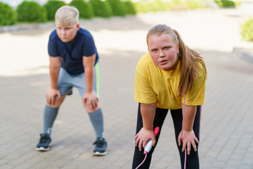 Losing weight and getting healthy with physical activity at a weight loss camp.