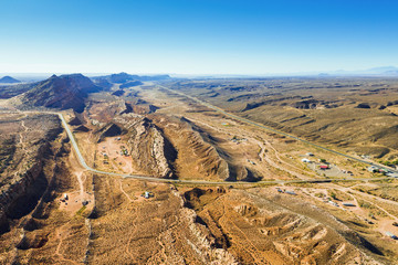 Fototapeta na wymiar Aerial landscape view of Arizona nature. Highway road, hill, blue sky. Morning. Arizona state. USA country