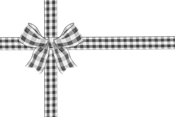 Black and white buffalo plaid Christmas gift bow and ribbon arranged as wrapped gift box isolated on a white background