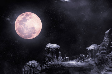 Naklejka na ściany i meble During the night time, the rocky mountains had full moon and stars.