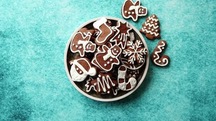 Delicious fresh Christmas decorated gingerbread cookies placed in wooden crate - Powered by Adobe