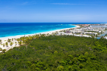 Caribbean beach of Atlantic ocean with luxury resorts, travel destination