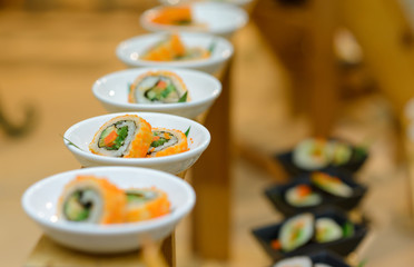 Assortment of sushi. appetizers in cocktail party. food catering