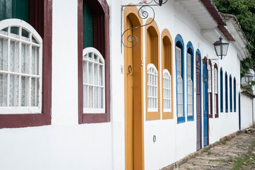 Street and old portuguese colonial houses in historic downtown in Paraty, state Rio de Janeiro, Brazil