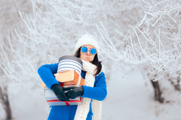 Tired Woman Carrying a Pile of Winter Christmas Gifts 