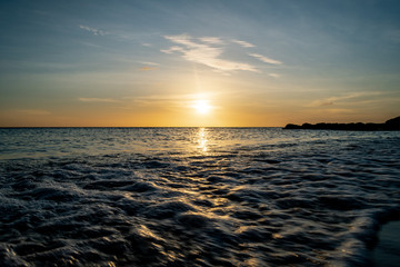 Water Rolling onto Shore during Sunset at Playa Porto Marie, Curaçao