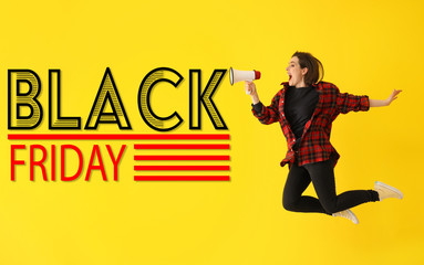Jumping young woman with megaphone and inscription BLACK FRIDAY on color background