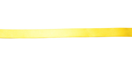 Obraz premium Beautiful golden ribbon on white background
