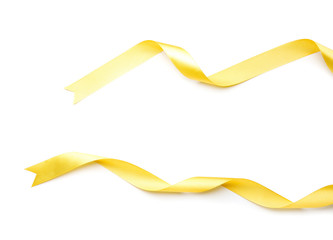 Beautiful golden ribbons on white background