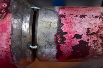 Closeup tack weld connection between pipe reduce. Fit-up pipeline before welding by Tungsten Inert...