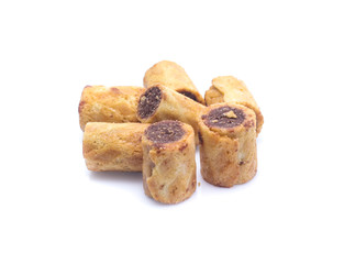 sweet dessert chocolate biscuit roll isolated on white background