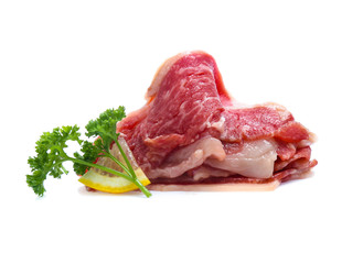 Fresh raw beef meat slices isolated over white background