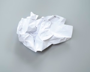 crumpled White paper, Waste paper on gray background.