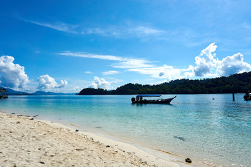 LANGKAWI, MALAYSIA - OCTOBER 15.2019:: Boat at Beach at island hopping in Langkawi