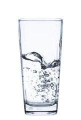 pouring water on a glass on white background clipping path