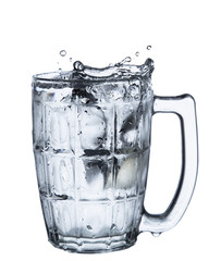 pouring water on a glass on white background clipping path