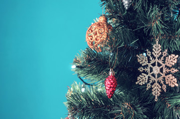 Christmas fir tree decorated with bright toys on Christmas and New Year