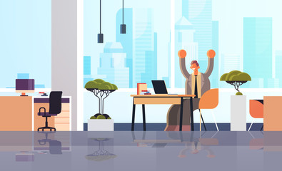 excited businessman with raised hands business man sitting at workplace with laptop celebrating success concept modern office interior flat full length horizontal vector illustration