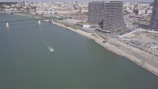 Fantastic non graded aerial establishing shot of Sava river Old train bridge and Belgrade Waterfront