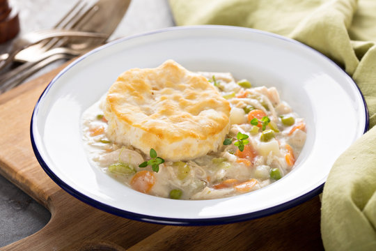 Individual chicken pot pie plate with a biscuit on top