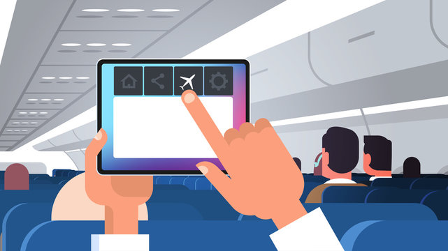 human hand holding tablet pc with flight mode rules of airplane safety concept modern plane board with passengers horizontal flat vector illustration