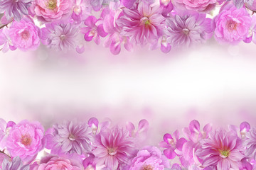 beautiful mix of roses,orchid and dahlia flower frame in pink background with copy space 