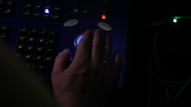 remote recordists closeup. Hand adjusts sound effects. Electric machine on table for working of sound designer or club dj at party in nightclub. Occupation for modern lifestyle, objects for listen at 