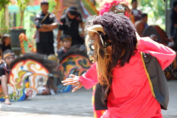 Jatilan/Jhatilan dancer using various mask.