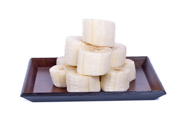 Sliced bananas on a white background