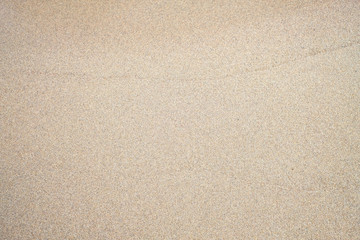 Fototapeta na wymiar texture of yellow sand on the sea