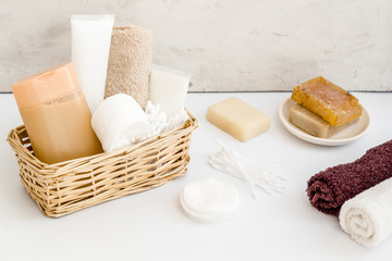 Bathroom cosmetics and hygiene products on white background