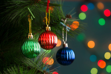 Beautiful Christmas tree with decor against blurred lights on background