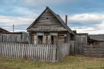 Fototapeta na wymiar Ural village. Abandoned house.