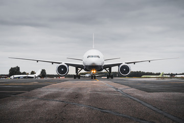 Fototapeta na wymiar big plane in airport on runway