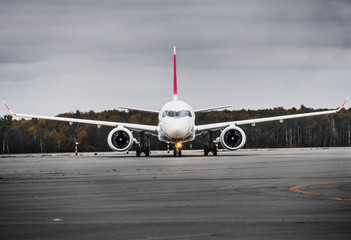 small plane in airport on runway