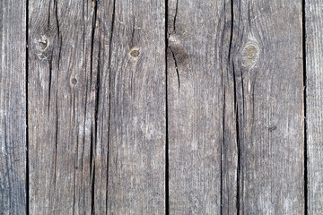 Natural wooden background. Vintage wooden texture. Old wooden boards with a knots close-up. 