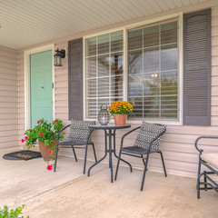 Square frame Front porch of modern home with outdoor furniture