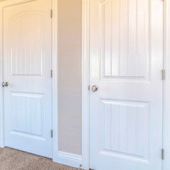 Square Interior of house with carpet stairwell and doors