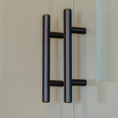 Square frame Close up of overhead kitchen cupboards and handles