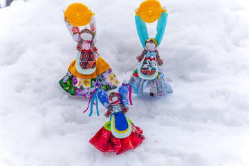 Russia, Samara, March 2019: Disposable Shrovetide dolls prepared for burning at the winter farewell...