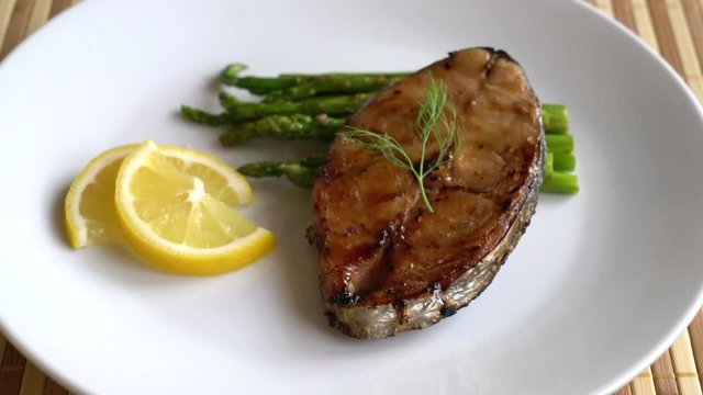 grilled mackerel fish steak on plate