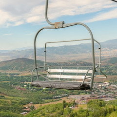 Square Chairlift and aerial view of a ski resort in Park City during off season months