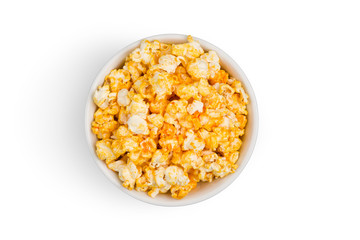 Top view (Flat lay) of popcorn coated with golden yellow caramel looks delicious isolated on white background with clipping path.