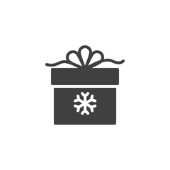 Christmas gift box with snowflake vector icon. filled flat sign for mobile concept and web design. Gift box with ribbon bow glyph icon. Symbol, logo illustration. Vector graphics