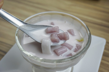 Small round balls made from taro mixed with tapioca flour with sweet coconut milk, Thai dessert called Bualoy.