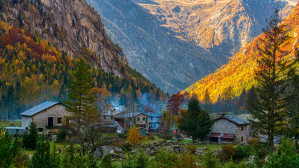 little village in autumn season on the mountains